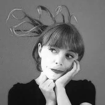 portrait Black-and-white portrait of May Abrantes.