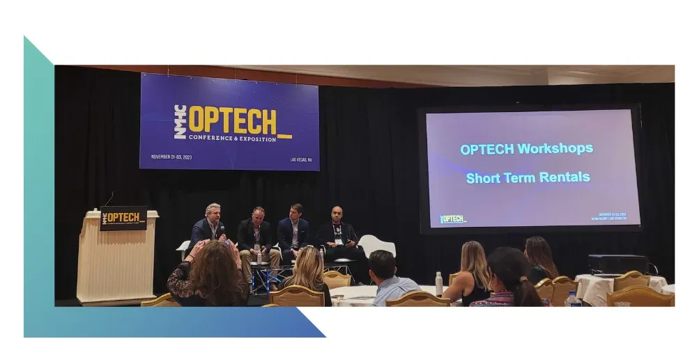 A panel discussion at the OPTECH 2023 conference.