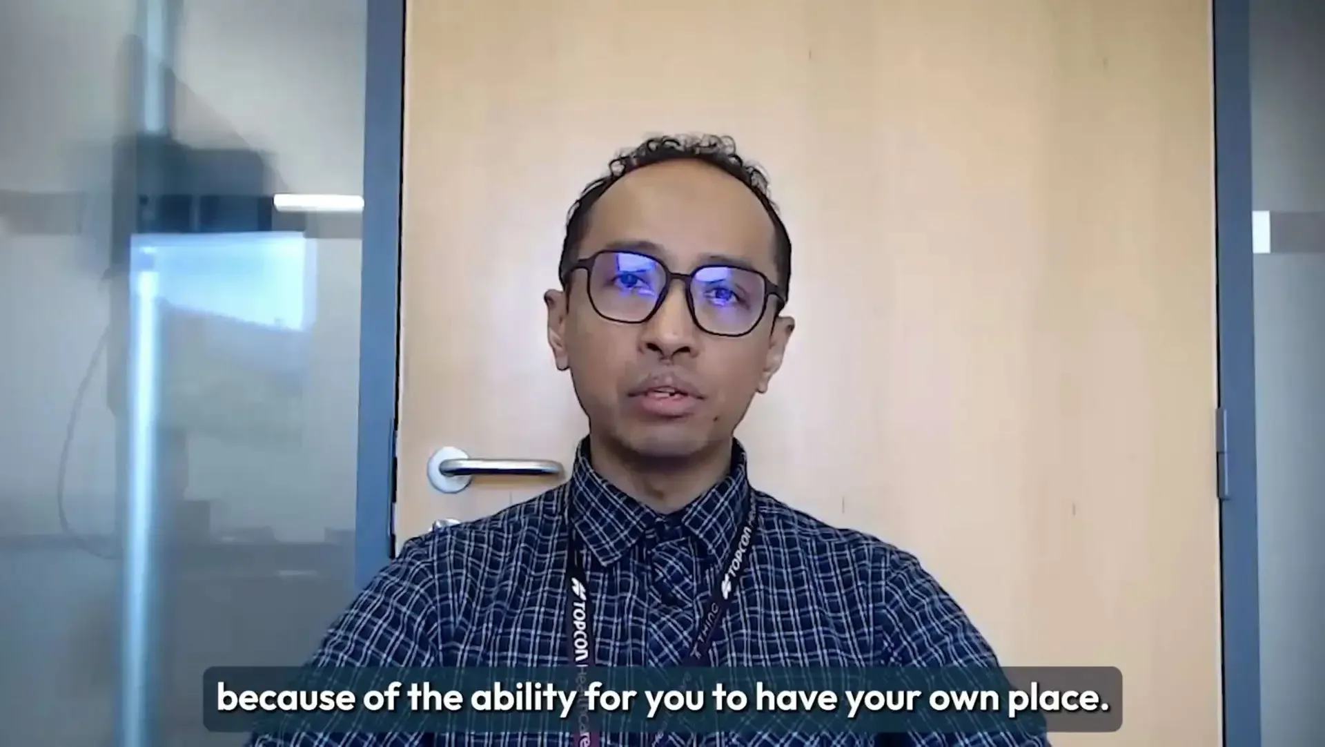 Salim speaking during a student accommodation interview.