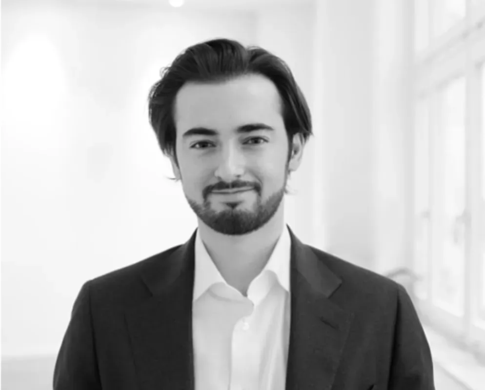 A black-and-white portrait of Ludovico, EU Expansion Manager.
