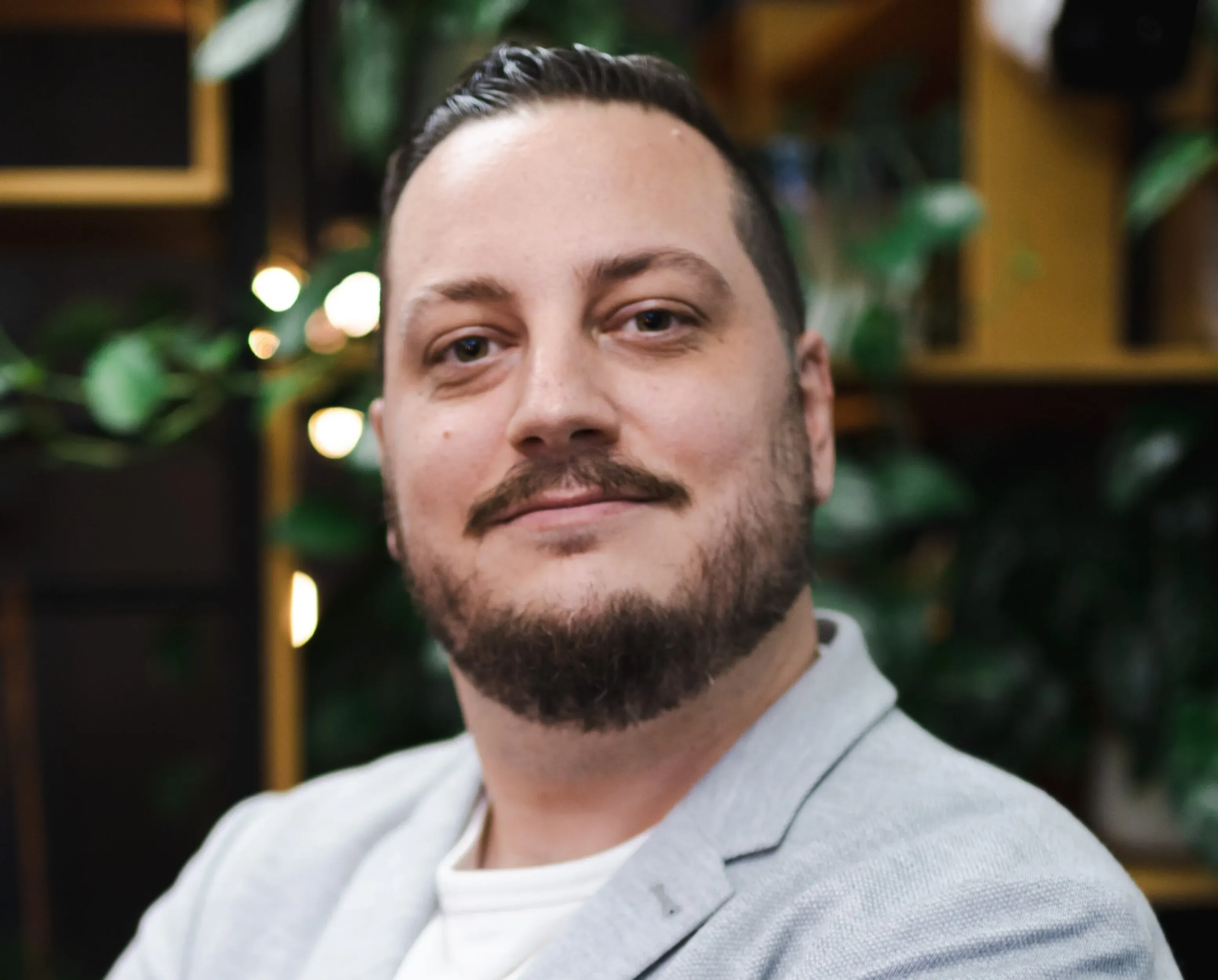 A portrait of Lewis, Financial Controller.
